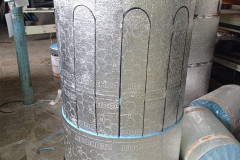 Foto-montazha-folgirovannogo-uteplitelya-na-polietilenovoj-emkosti-na-1000-litrov-F-950-mm-N-1500-mm